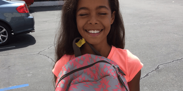 Giving Backpacks to Kids